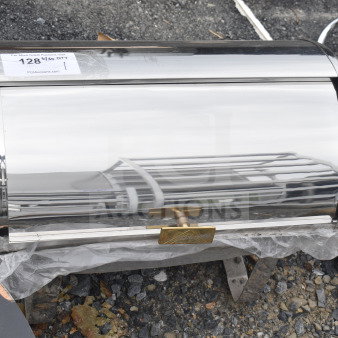 Stainless steel roll top chafer, sleek design, handle detail, auction tag with quantity visible, pristine condition.