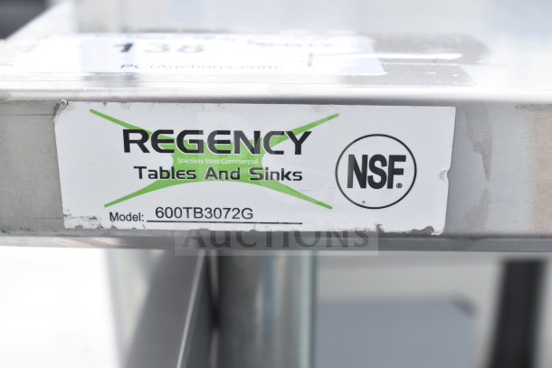 Regency 600TB3072G table label showing model and NSF logo, indicating commercial-grade stainless steel.