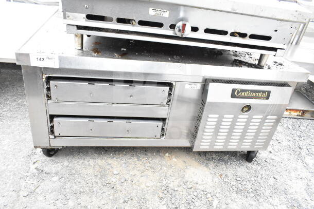 Continental Commercial 2-Drawer Chef Base on casters, stainless steel, 115V, 1 Phase, visible wear, with branding label.