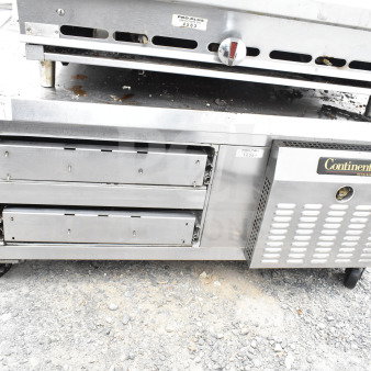Continental Commercial 2-Drawer Chef Base on casters, stainless steel, 115V, 1 Phase, visible wear, with branding label.