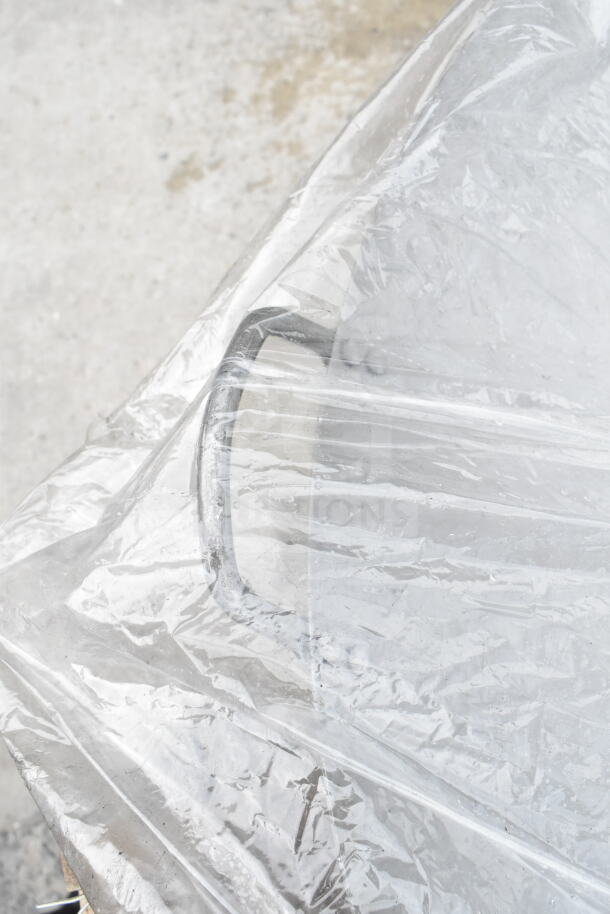 "Emperor's Select 30-inch Carbon Steel Cantonese Wok, brand new, covered in protective plastic, scratch and dent."