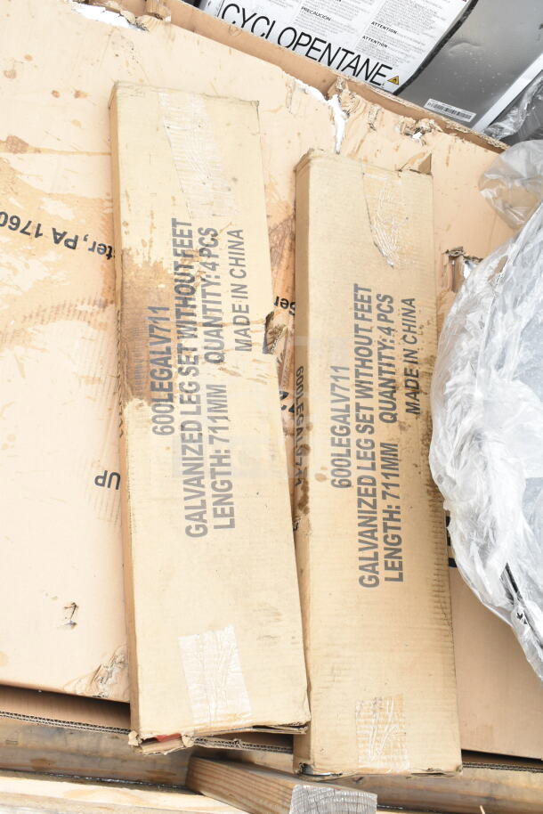 Cardboard boxes labeled "600LEGALV711 Galvanized Leg Set Without Feet, Length: 711mm, Quantity: 4 pcs, Made in China" in new condition.