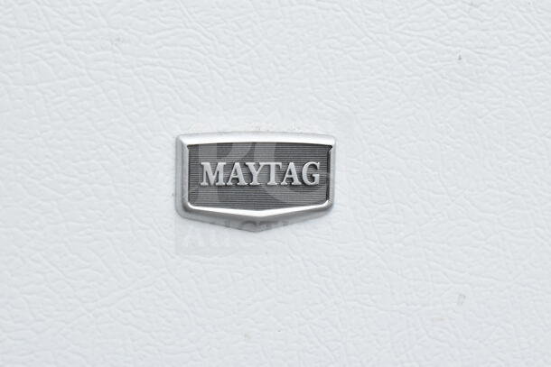 Maytag M1TXEGMYW01 reach-in cooler with freezer, 115 volts, 1 phase, visible brand logo.