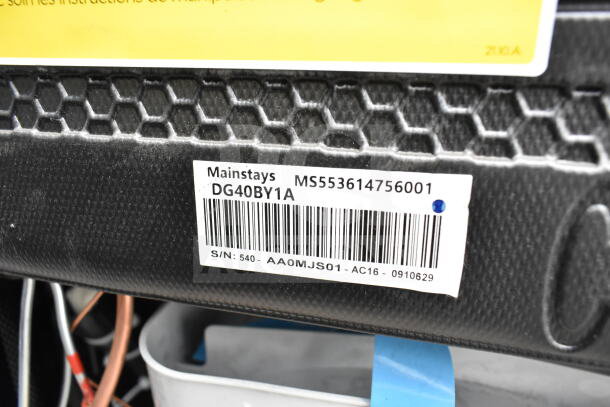 Mainstays mini cooler label with model DG40BY1A, barcode, and serial number S/N: 540-AA0MJS01-AC16.