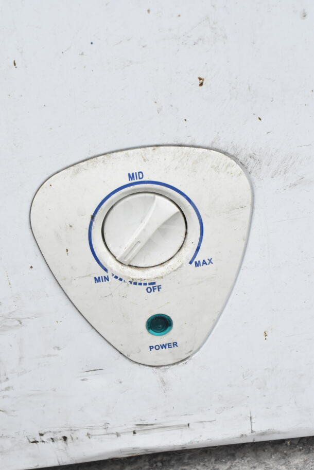 Close-up of temperature control knob on appliance with settings from Off to Max, showing wear and dirt.