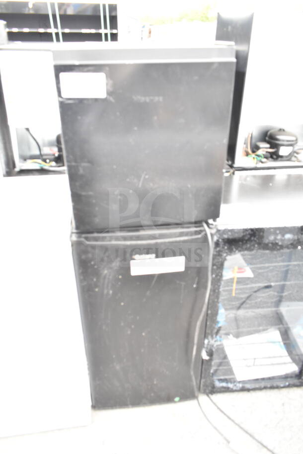 Two mini coolers, brands Hisense and Galanz, black, 120 volts, 1 phase. Scratches visible; labels partially shown.