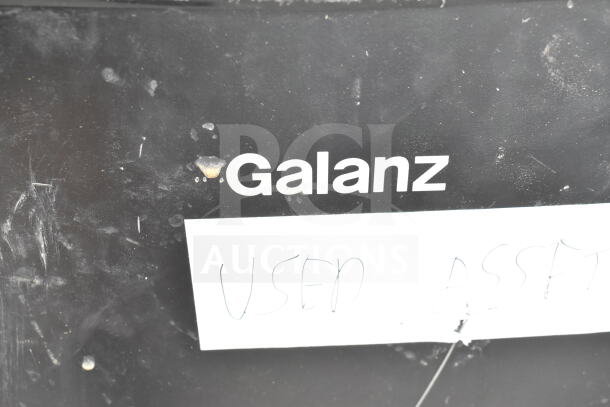 Hisense and Galanz mini coolers, used condition, 120 volts, 1 phase; Galanz logo visible with wear marks.