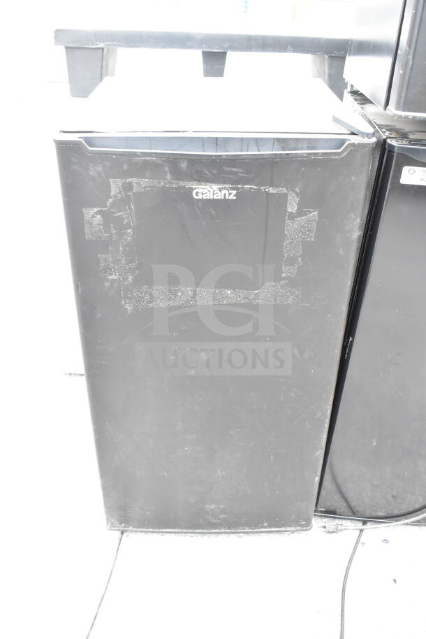Five mini coolers, brands include Galanz and Igloo, 115 volts, 1 phase. Used condition, exterior wear visible.