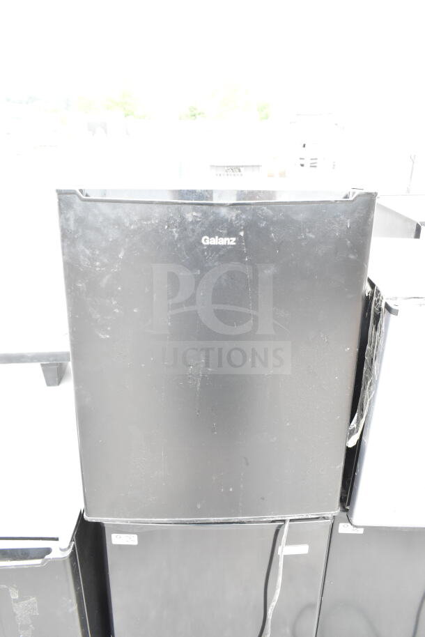 Set of 5 mini coolers including Galanz and Igloo; 115 volts, 1 phase. Used condition. Includes energy tags.