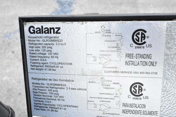 Galanz mini cooler label showing model GLR33MBKE23, 3.3 cu.ft capacity, 120 VAC, refrigerant R600a, and installation info.