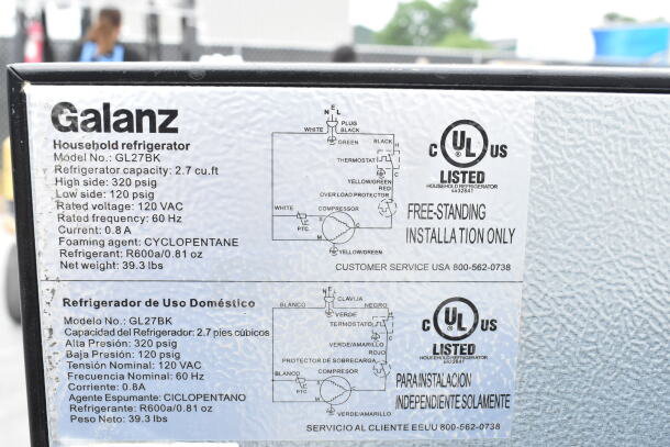 5 mini coolers, including Galanz GL27BK model. Features: 2.7 cu. ft., 120 VAC, 60 Hz. Labels show specifications and installation instructions.