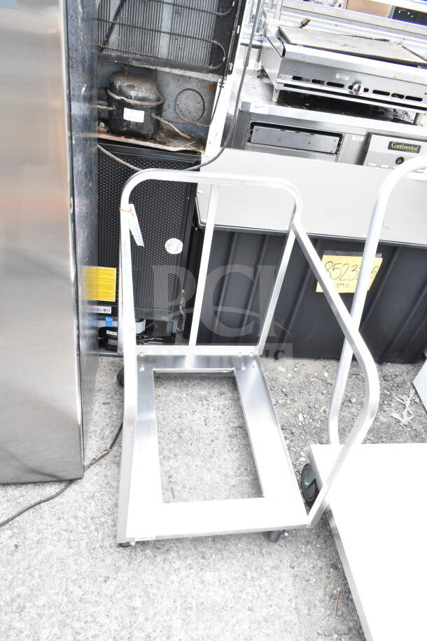 BRAND NEW Regency 600BPTWD Aluminum Bun Pan Truck, fully welded, minor dents, sturdy construction, ideal for kitchens.