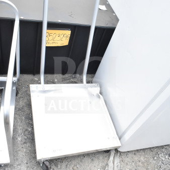 Brand new Regency aluminum dolly, 23 3/16" x 23 3/16", with handle, minor scratches, model 600GRDASH.