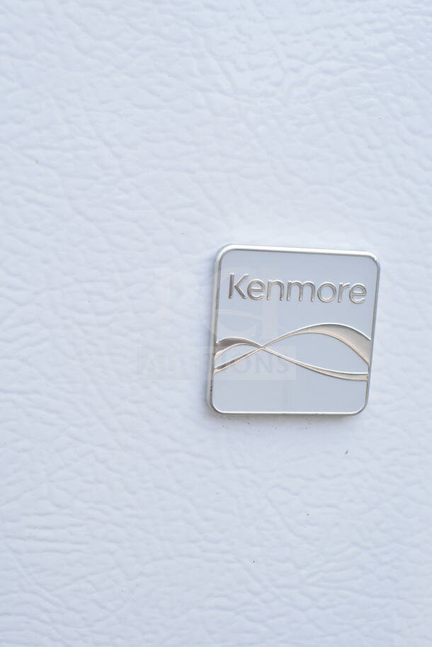 Kenmore Reach In Cooler w/ Freezer, logo label on white exterior, 115 Volts, 1 Phase.