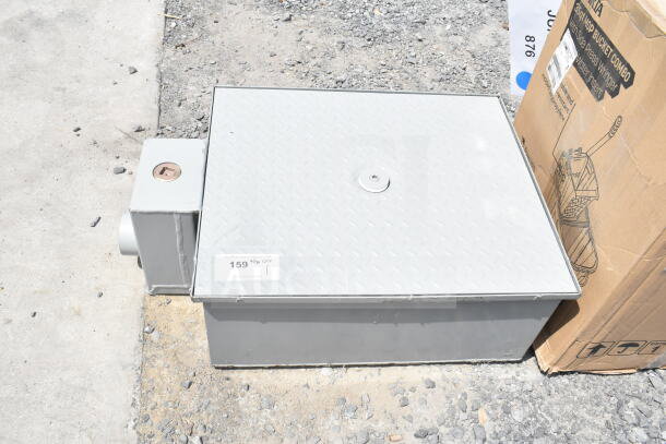BRAND NEW SCRATCH AND DENT Zurn Elkay GT2701-20-3NH 40 lb. grease trap with 3" no-hub connections, low-profile design.