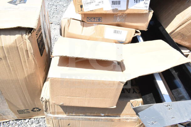 Boxes containing 18 new scratch and dent items, including a Speed Rail and Canopy Tent, some with visible wear.