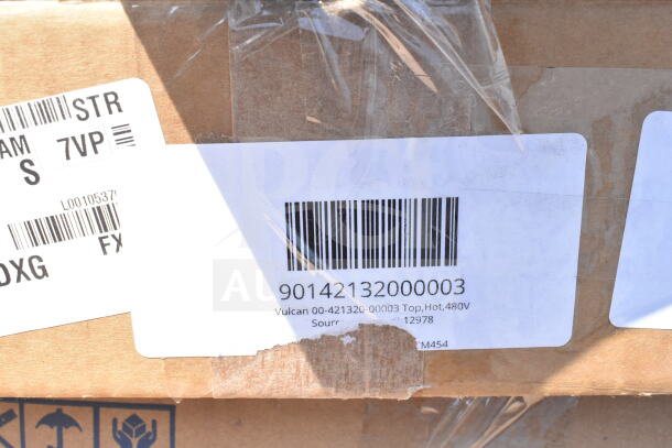 Box with label showing barcode 90142132000003, Vulcan 00-421320-00003, 480V. Part of auction lot with scratch and dent items.