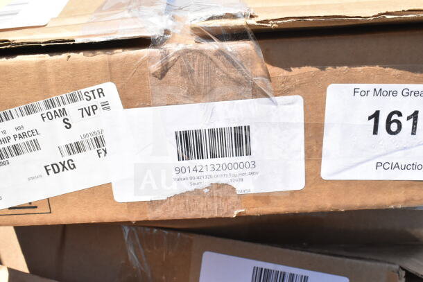 Cardboard box with shipping labels for auction items. Includes barcode and "Vulcan 00-421320" marking. Scratch and dent condition.