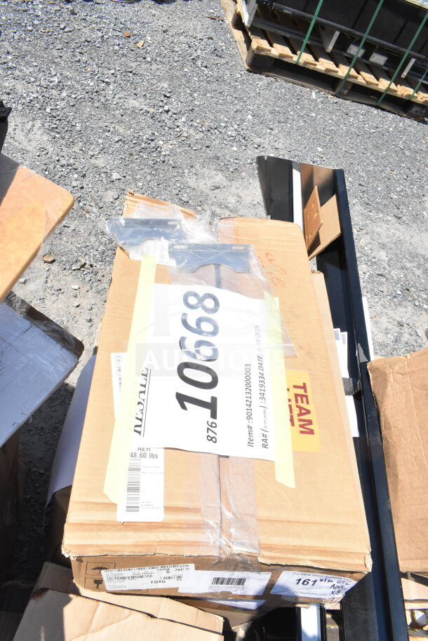 Cardboard box with label number "10668," displaying "Scratch and Dent" items, including speed rail and canopy tent. Box weight: 48.60 lbs.