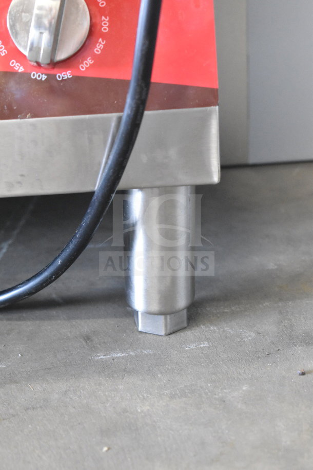 Avantco 177EG30N EG30N 30" Electric Griddle leg and temperature dial, visible wiring, stainless steel construction.