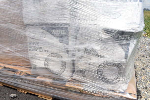 Pallet of 30 brand new scratch and dent items wrapped in plastic, including "Wave 10-inch Round Plastic Plates," 48 per case.