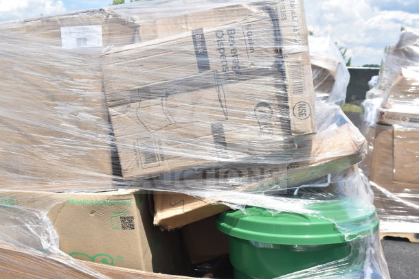 Paletted carton boxes with visible "Beverage Dispenser" label and green container, wrapped in plastic film, minor damage.
