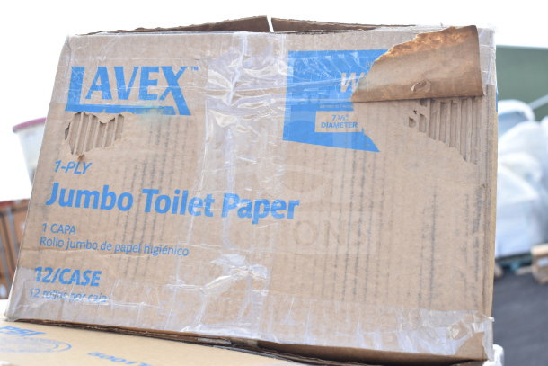Box of Lavex Jumbo Toilet Paper, 1-ply, 12 rolls per case, scratch and dent condition, visible box damage.