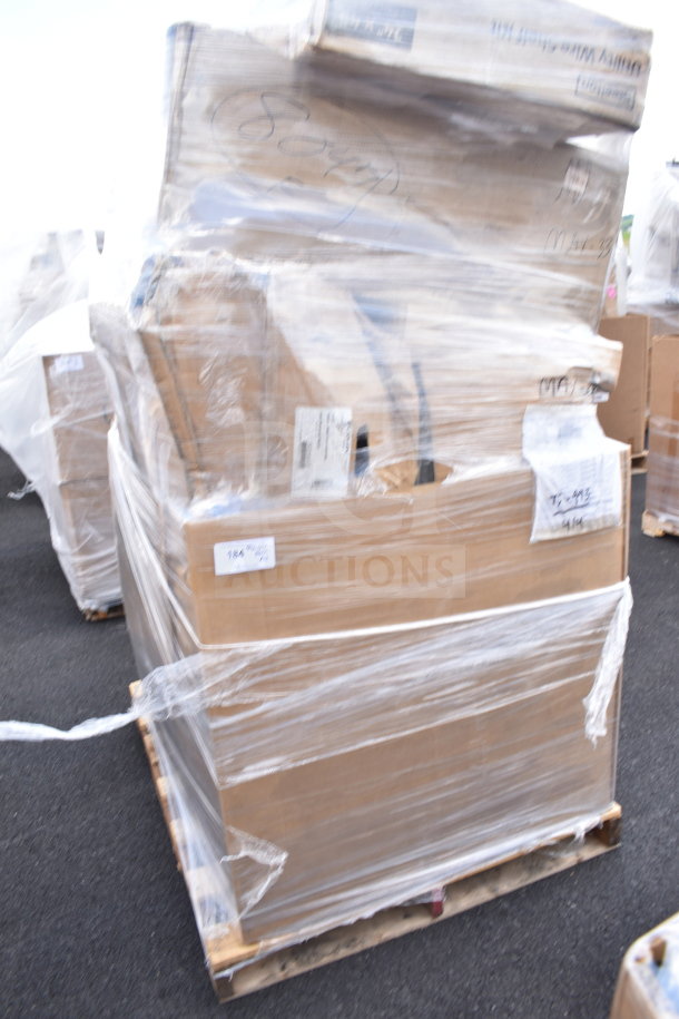 Pallet with 12 new scratch and dent items including shelf kit and security cage, wrapped in plastic. Boxes show labels and markings.