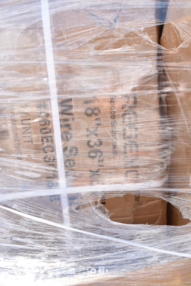 Shrink-wrapped pallet of 12 new scratch and dent items including a shelf kit and security cage, visible box markings.