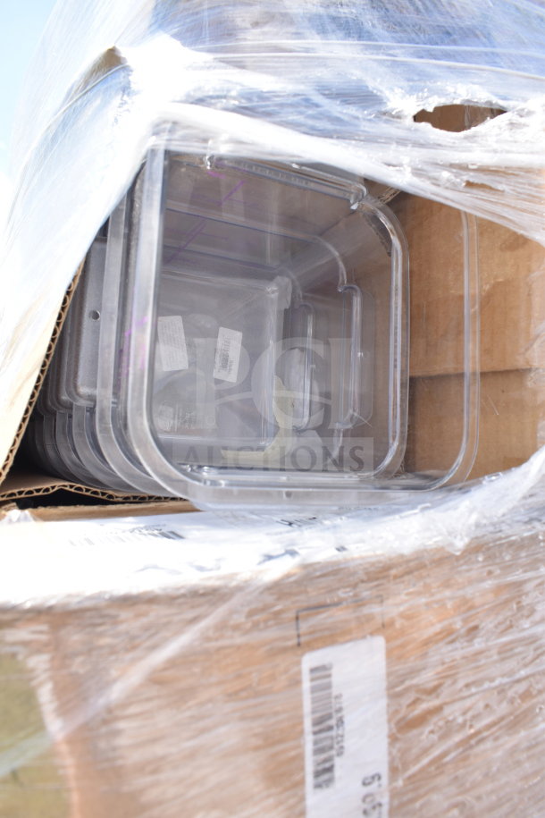 15 brand new scratch and dent items, including butcher block tabletops, wrapped in plastic on a pallet.