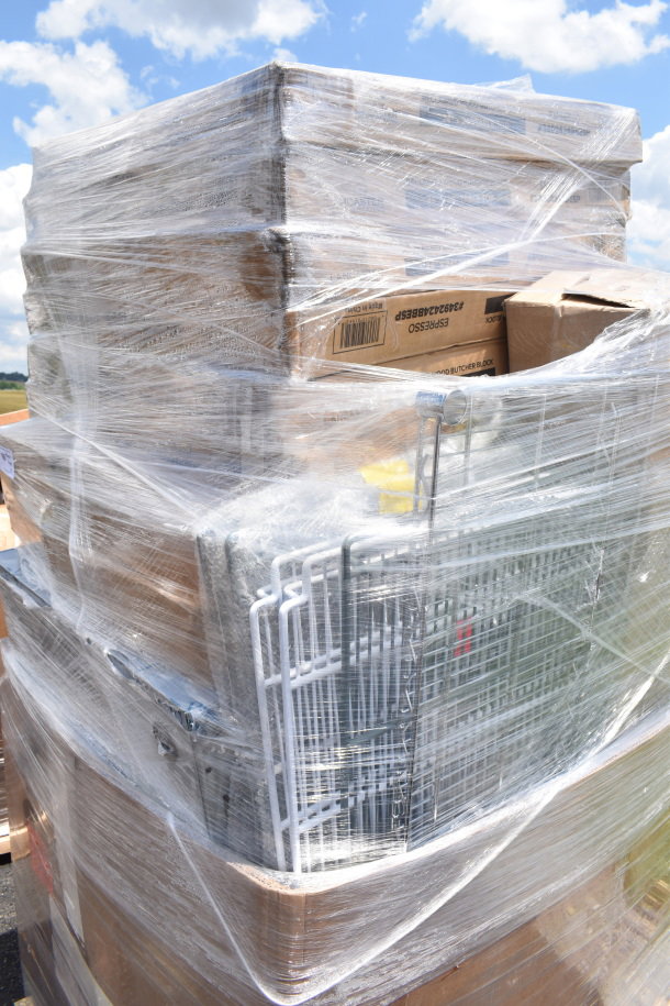 15 brand new scratch and dent items, including butcher block tabletops, wrapped on a pallet. Some labels are visible.