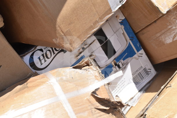 Cardboard boxes containing 18 new scratch and dent items, including visible "Choice" brand labels. Items include a mop sink and chafer.