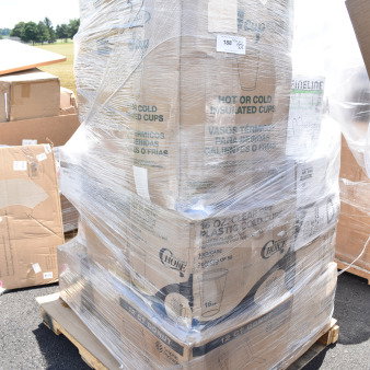 Pallet of 31 scratch and dent items, including cold cups and donut boxes, wrapped in plastic. Brand new condition.