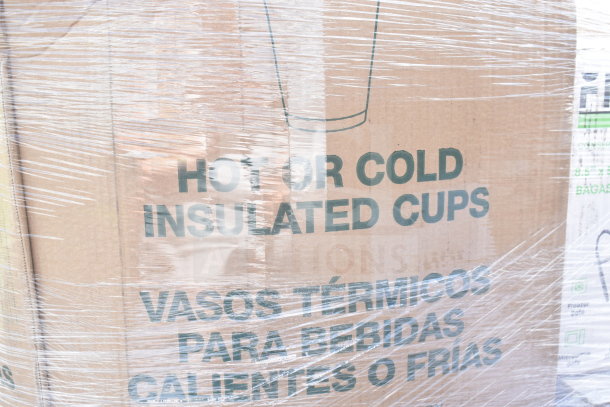 Plastic-wrapped cardboard box labeled "Hot or Cold Insulated Cups." Box in scratch and dent condition.