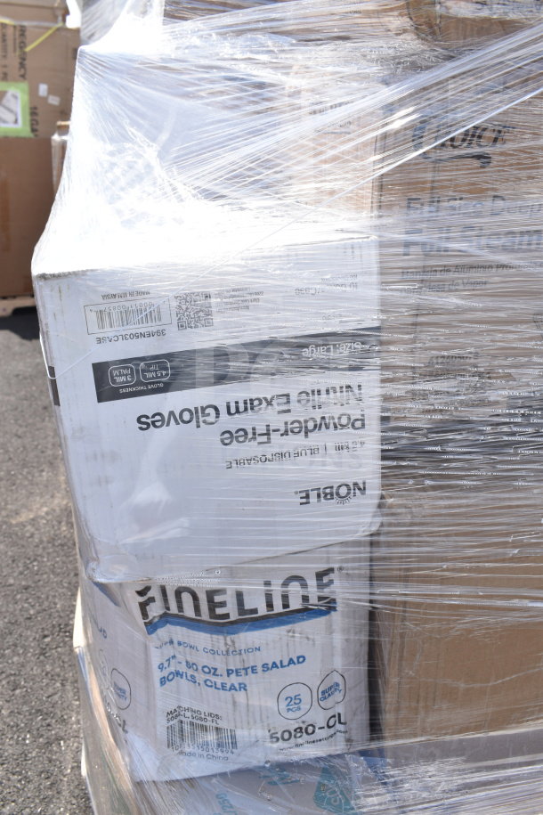 Plastic-wrapped pallet of mixed new items. Boxes labeled "Noble Gloves" and "Fineline Salad Bowls" visible, showing wear.