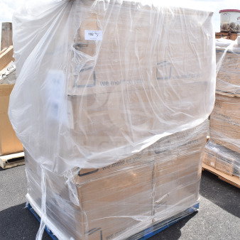 Stacked boxes of 32 oz white regular wall jars, shrink-wrapped on a pallet, labeled "we mold to you." New condition.