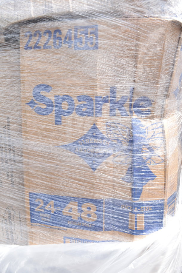 Shrink-wrapped boxes of Sparkle paper towels, marked "24 Double Rolls or 48 Regular Rolls" and "Pick-A-Size".