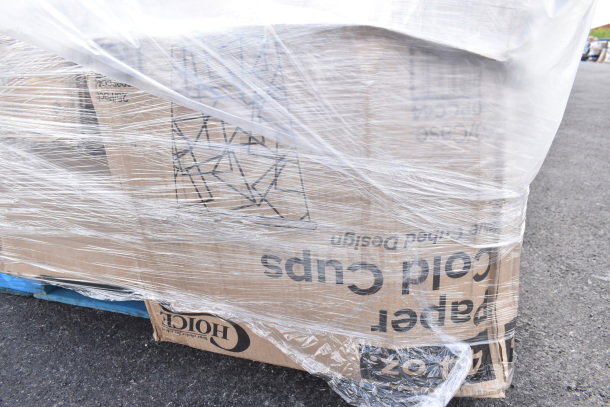 28 new scratch and dent items on a pallet. Includes ice bin, portion cups, containers wrapped in plastic. Hioch label visible.