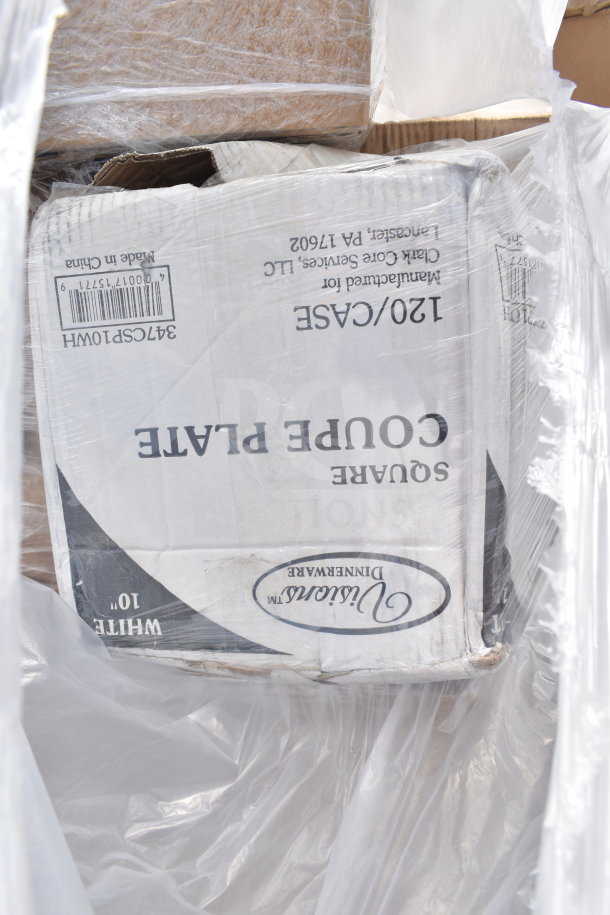 Box of coupe plates marked "Lifetime Dinnerware" and "Square White 10", partially wrapped in plastic, indicating scratch and dent condition.