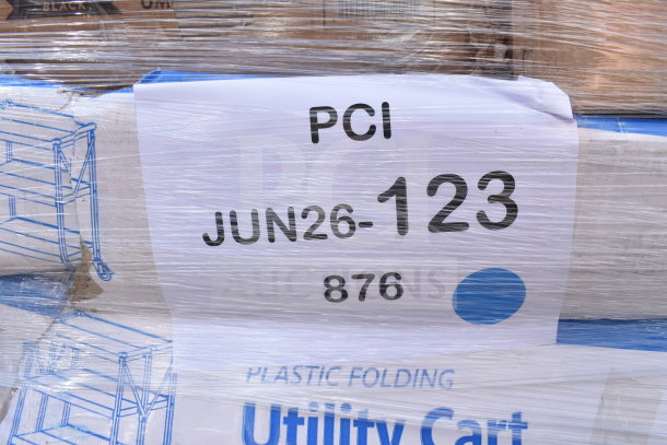 13 brand new scratch and dent items wrapped, including utility cart, umbrella base, and stanchion. Visible label: "JUN26-123".