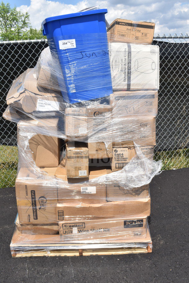 Stack of 36 boxed items including a wire shelf kit, fast food trays, and glasses, wrapped on a pallet. Scratch and dent condition.