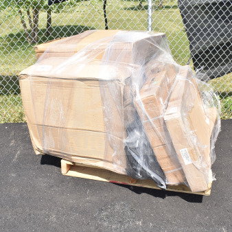 Packaged lot of 8 scratch and dent items, including an umbrella base, floor mat, and sink. Brand new, wrapped on a pallet.