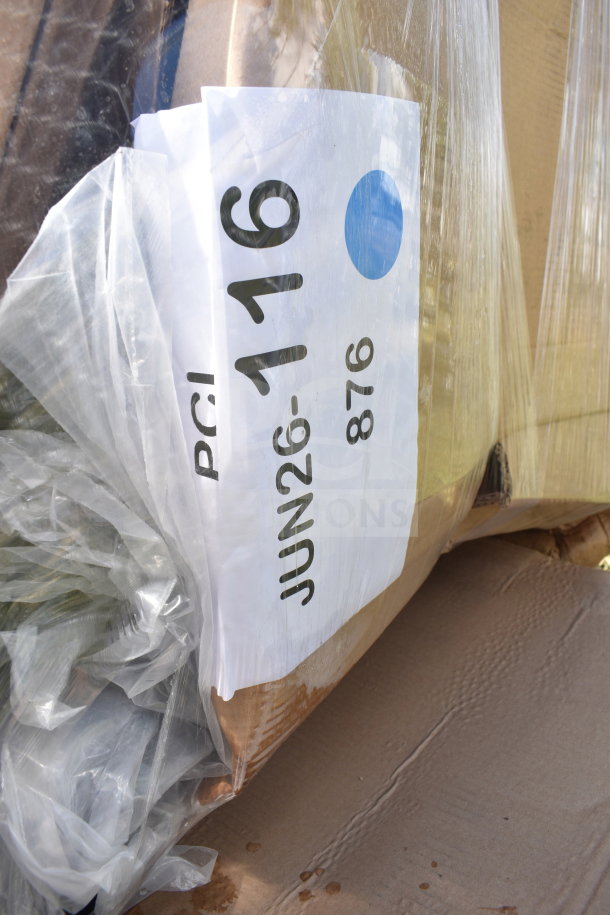 Wrapped pallet labeled "JUN26-116," containing 8 new scratch and dent items like an umbrella base, floor mat, and sink.