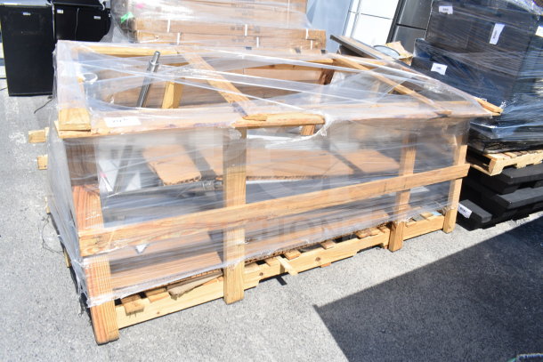 Brand new Regency 600ST3096L 30" x 96" stainless steel work table with left sink, in scratch and dent condition, on pallet.
