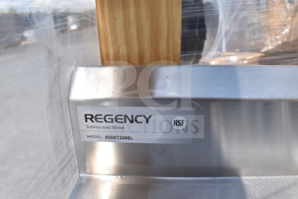 BRAND NEW Regency 600ST3096L stainless steel work table with left sink. 30" x 96", 16 gauge. Scratch and dent condition.