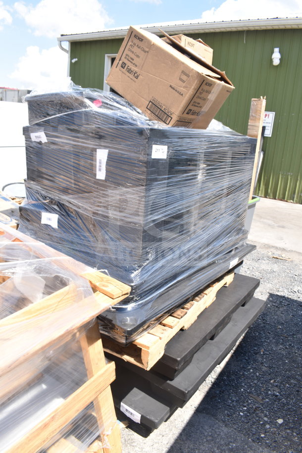 Pallet of 12 new scratch and dent items wrapped in plastic, includes display base and cups, labels indicate item details.