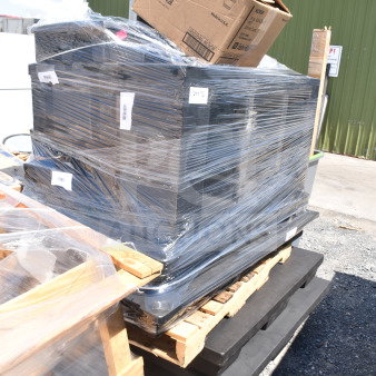 Pallet of 12 new scratch and dent items wrapped in plastic, includes display base and cups, labels indicate item details.
