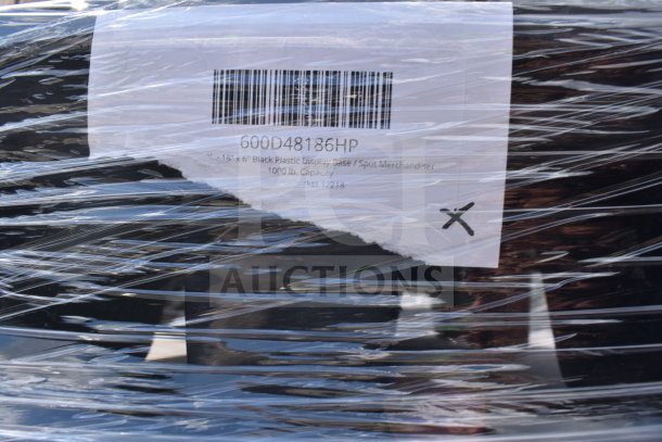 12 new items including a black plastic display base and cups, 1000 lb capacity. Item code 600D48186HP. Scratches noted.