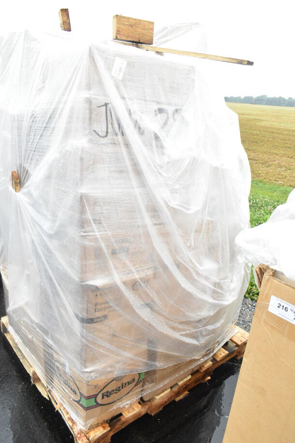 Pallet with 34 new scratch and dent items under plastic wrap, including wine glasses and mop bucket. Visible "JUN26-29" marking.