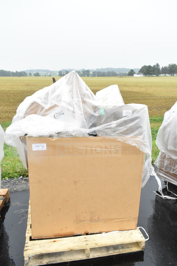 Cardboard box of 12 new scratch and dent items, including sieve, chafer, sink bowl, wrapped in plastic on a pallet.